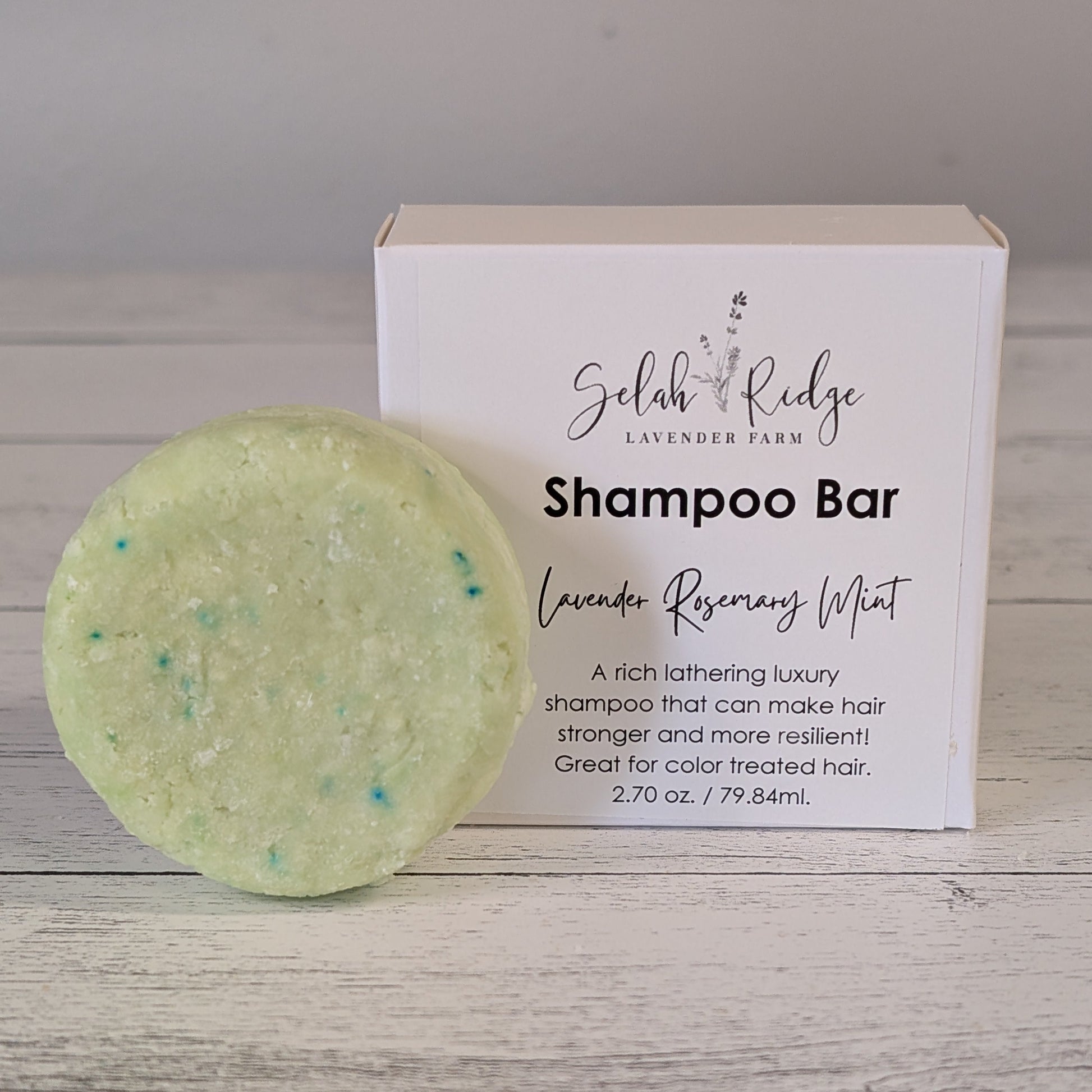Shampoo bar with packaging on a wooden surface