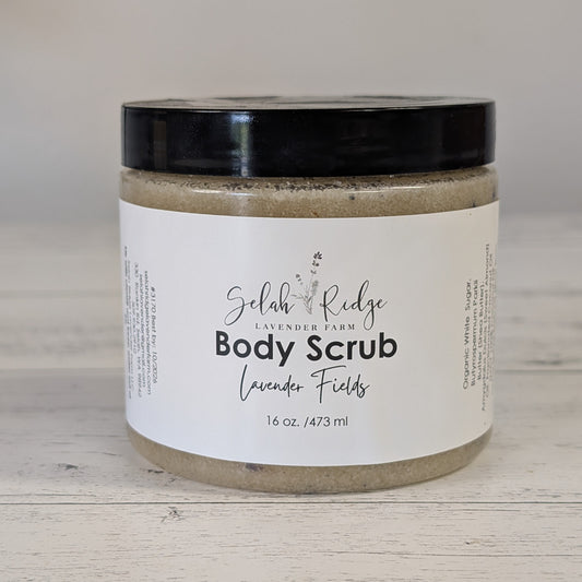 Jar of Selah & Ridge Body Scrub on a wooden surface